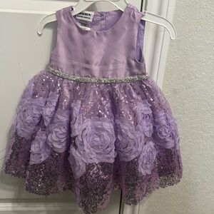 Beautiful special occasions dress, brand new without tags.